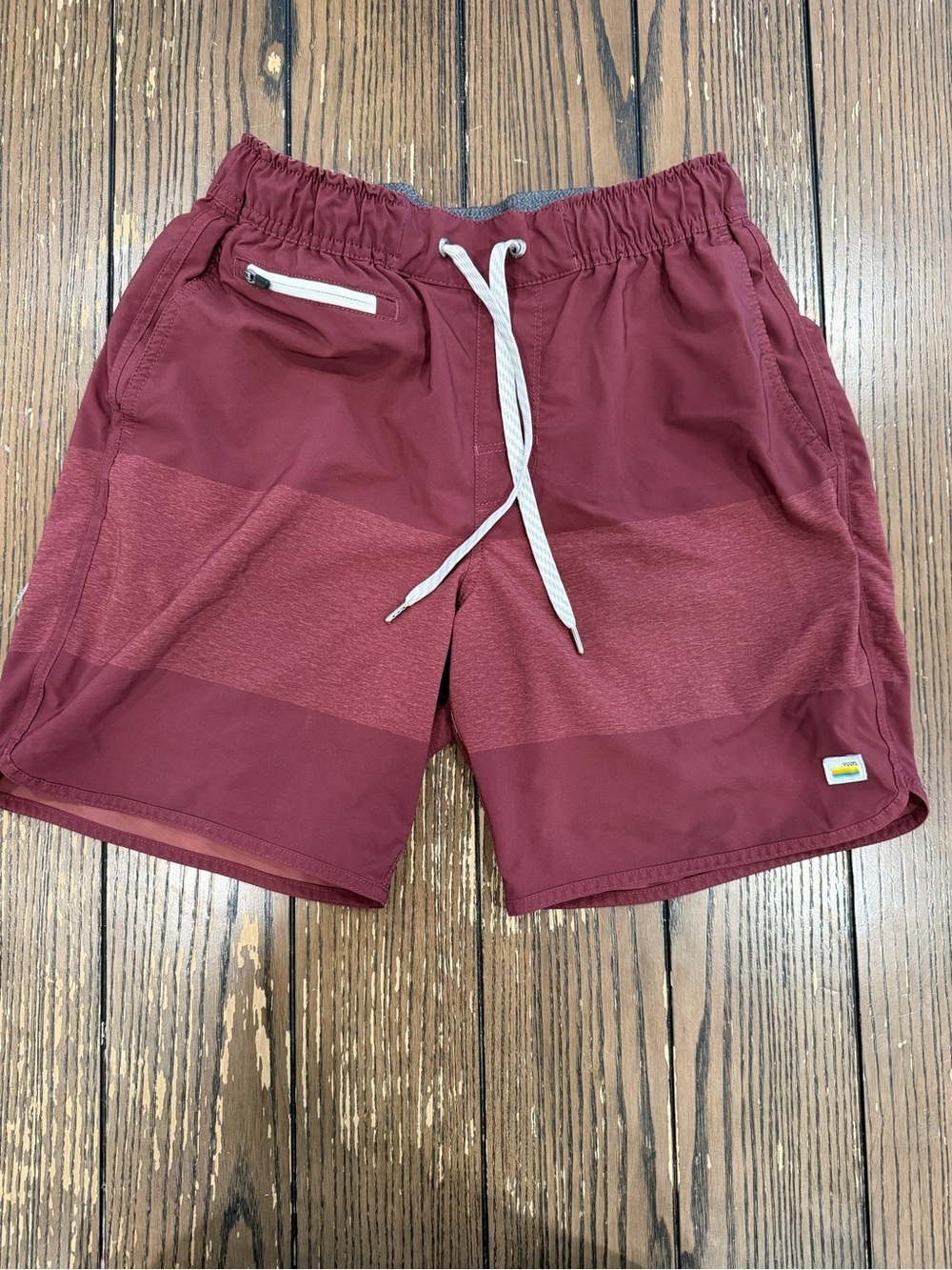 Vuori Burgundy Shorts with Yellow & Blue Logo Accent